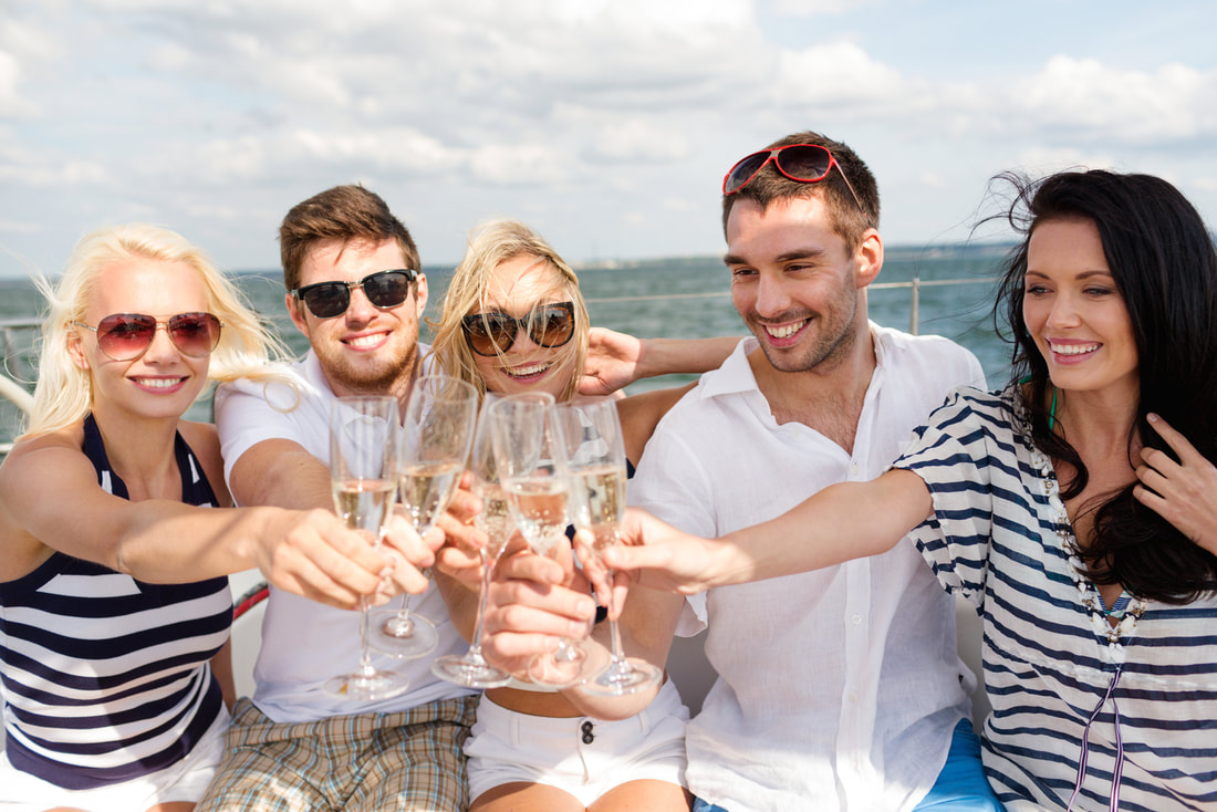 a group of people celebrating in the yacht